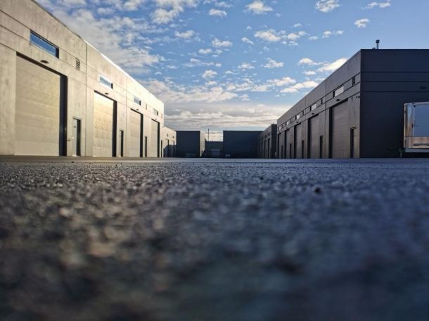 Ground View of Multiple Buildings at Dusk 